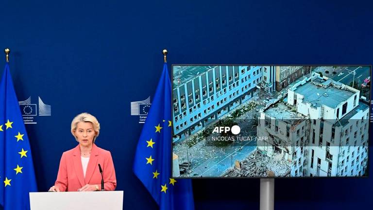 European Commission President Ursula Von der Leyen delivers a statement after a Russian missile and drone attack on apartment blocks of the Ukrainian capital Kyiv that killed at least 14 people, including three children, also hit the European Union mission’s building, at the EU headquarters in Brussels on August 28, 2025. - Nicolas TUCAT / AFP