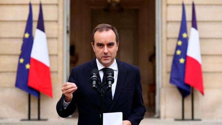French outgoing Prime Minister Sebastien Lecornu, who presented his government’s resignation to the French president this morning, delivers a statement at the Hotel Matignon in Paris, France, October 6, 2025. REUTERS/Stephane Mahe/Pool