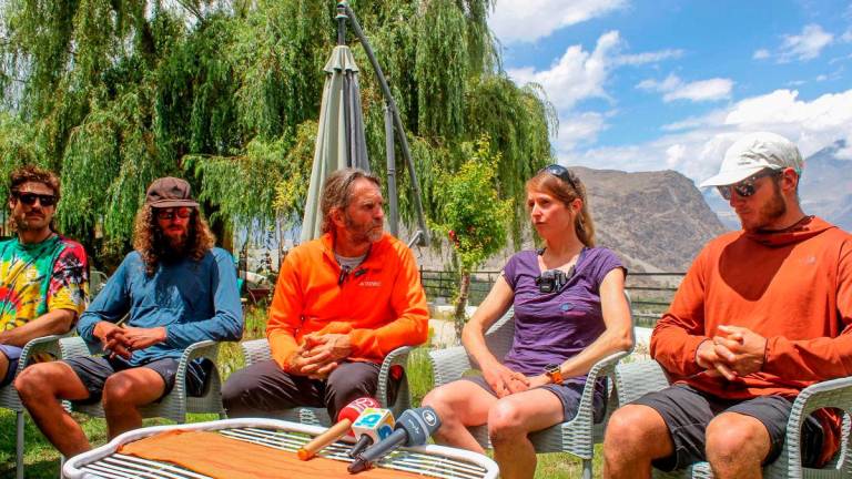 Marina Eva (2R), mountaineering partner of German Olympic biathlon champion Laura Dahlmeier, speaks during a press conference along with the rescue team members in Skardu in Pakistan’s mountainous Gilgit-Baltistan region on July 31, 2025. - AFPPix