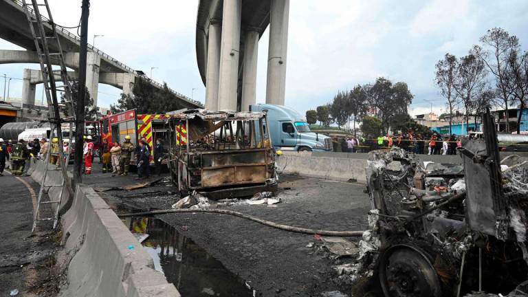 Mexican firefighters guard the area where a gas truck exploded in Mexico City on September 10, 2025. Nearly 60 people were wounded, 19 gravely, when a gas truck exploded in Mexico City on September 10, 2025, causing widespread damage, municipal officials said. (Photo by Valentina ALPIDE / AFP)