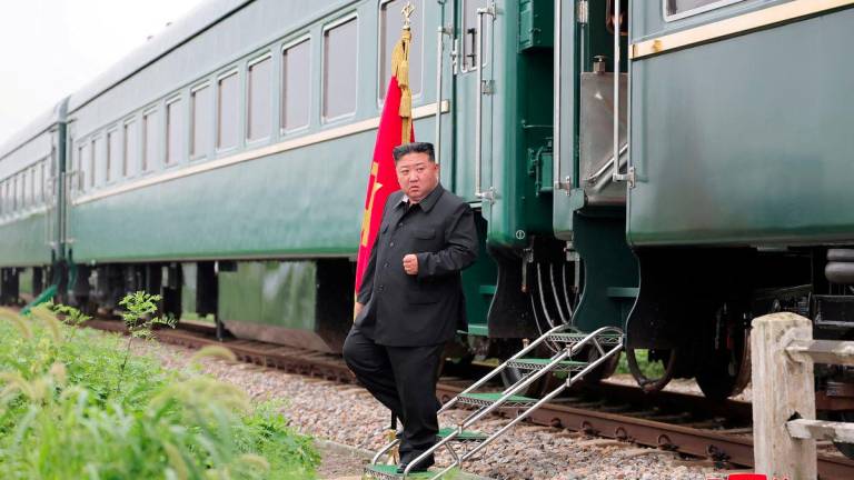 North Korean leader Kim Jong Un steps off a train during a visit to a flood-affected area near the border with China, in North Pyongan Province, North Korea, in this undated photo released July 31, 2024 by North Korea's official Korean Central News Agency. - KCNA via REUTERSPIX