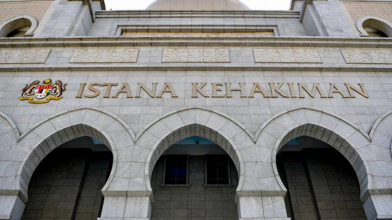 PUTRAJAYA, 13 Feb -- Mahkamah Persekutuan, dalam keputusan majoriti 4-3, memutuskan anak orang Islam yang dilahirkan di luar ikatan perkahwinan atau tidak sah taraf tidak boleh di bin atau binti dengan nama bapanya di Istana Kehakiman hari ini.--fotoBERNAMA (2020) HAK CIPTA TERPELIHARA