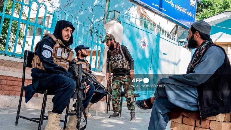 Taliban security personnel keep watch after the Eid al-Adha prayers at a checkpoint in Kabul on June 7, 2025. - Wakil KOHSAR / AFP