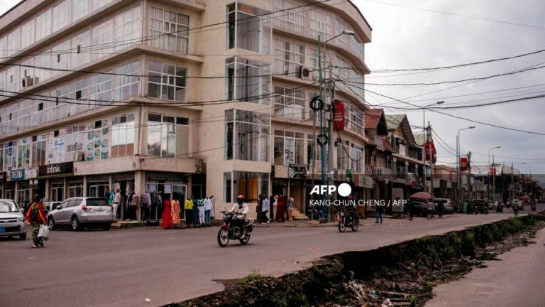 A general view of a street where pedestrians walk and motorcyclist drive in Goma in the eastern Democratic Republic of the Congo - AFPPIX