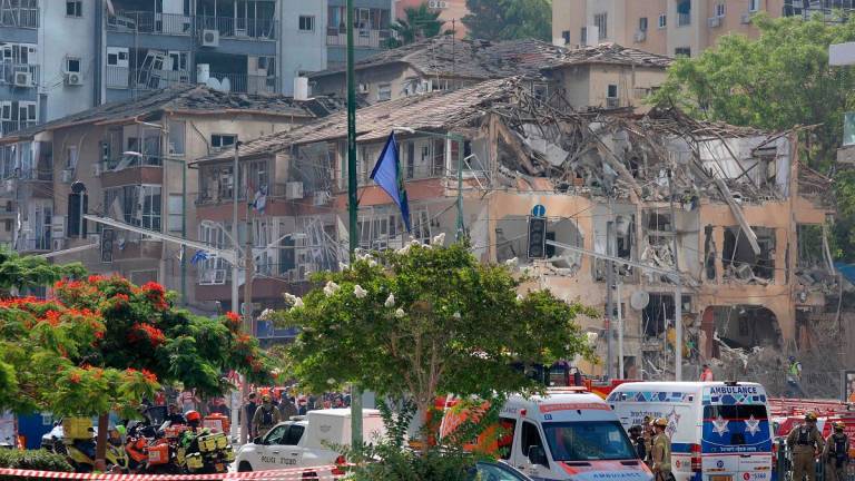 A destroyed building is pictured at the site of an Iranian missile attack in Ramat Gan in central Israel near Tel Aviv, on June 19, 2025. A hospital in southern Israel was hit during a barrage of “dozens” of Iranian missiles on June 19, officials said, while another impact was reported by emergency services in the Tel Aviv area. - GIL COHEN-MAGEN / AFP