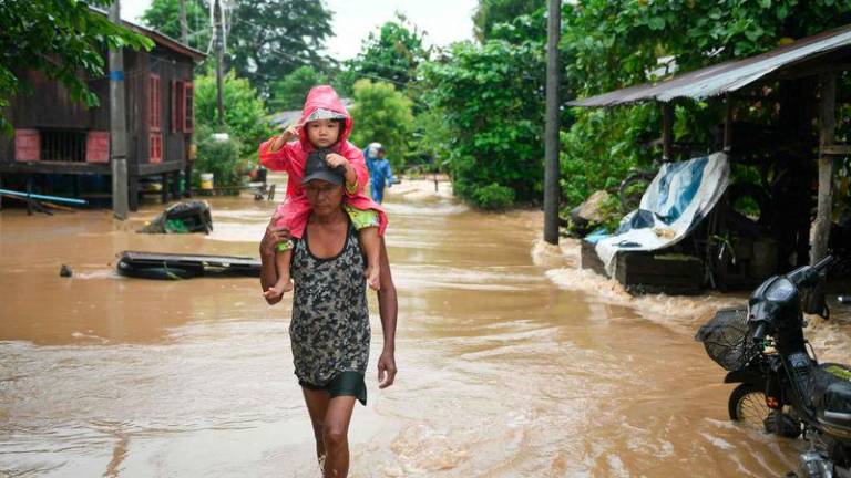 Deadly floods and landslides triggered by Typhoon Yagi have affected nearly six million children across southeast Asia, the UN said September 18, as the death toll from the disaster rose. - AFPPIX