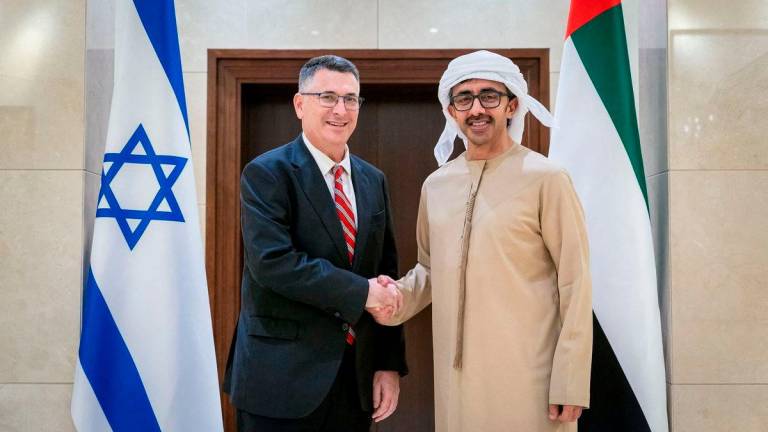 United Arab Emirates Minister of Foreign Affairs Sheikh Abdullah bin Zayed Al Nahyan shakes hands with Israel’s Foreign Minister Gideon Sa’ar during a meeting in Abu Dhabi, United Arab Emirates, in this handout picture obtained by Reuters on January 7, 2025. REUTERSpix