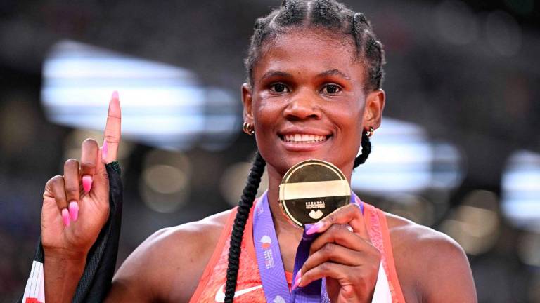 Gold medallist Kenya’s athlete Lilian Odira celebrates after winning the women’s 800m final during the World Athletics Championships in Tokyo on September 21, 2025. - Kirill KUDRYAVTSEV / AFP