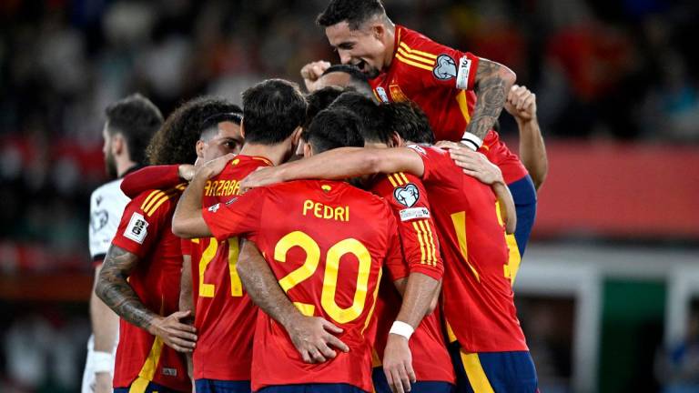 Spain’s Mikel Oyarzabal celebrates scoring their second goal with teammates. - REUTERS/Pablo Morano