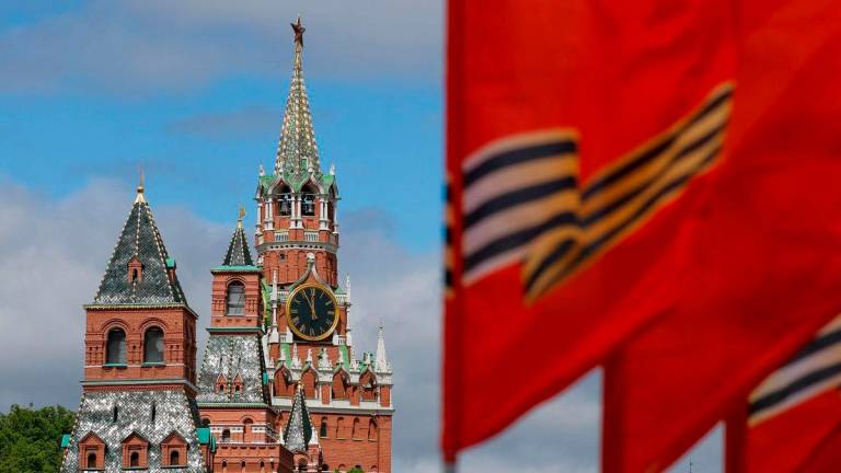 Flags fly in front of towers of the Kremlin on the eve of Victory Day marking the 80th anniversary of the victory over Nazi Germany in World War Two, in central Moscow, Russia, May 8, 2025. REUTERSpix