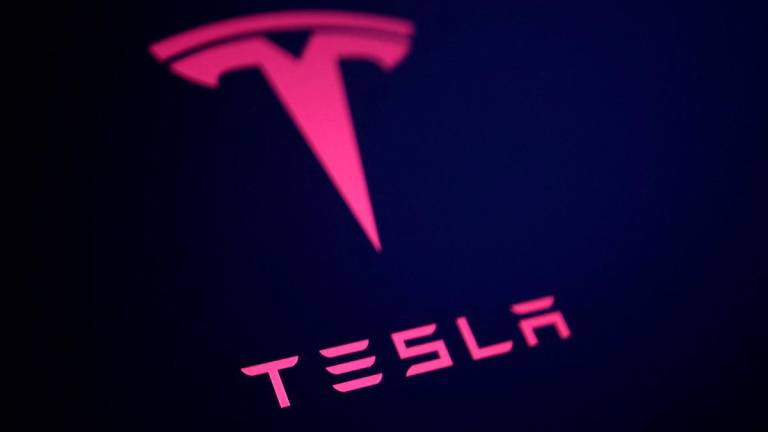 Tesla logo is seen in this illustration taken July 23, 2025. REUTERS/Dado Ruvic/Illustration