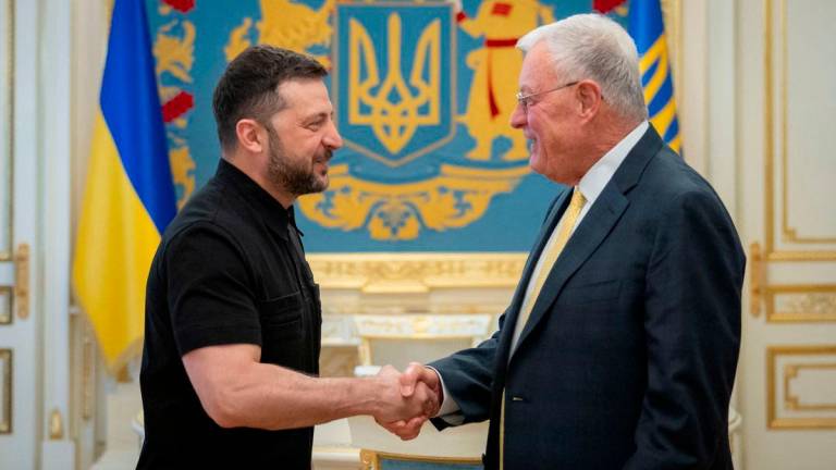 Ukraine’s President Volodymyr Zelenskiy shakes hands with U.S. Special Envoy for Ukraine Keith Kellogg. Credit: Ukrainian Presidential Press Service/Handout via REUTERS