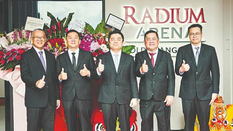 From left: Radium Development independent non-executive chairman Tan Sri Mhd Amin Nordin Abd Aziz, executive director Gan Kok Peng, Gary Gan, executive director Gan Tiong Kian and executive director and legal and human resource head Chai Woon Hou the at opening of the Radium Arena sales gallery.