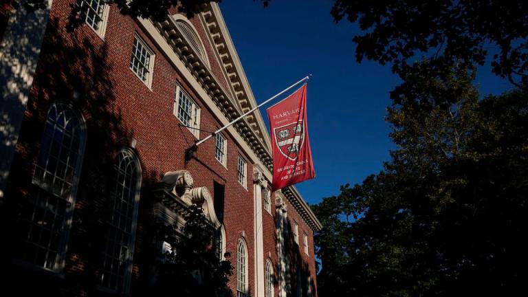 A flag hangs on campus at Harvard University in Cambridge, Massachusetts, U.S. - REUTERSPIX