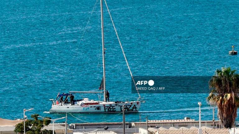 A boat from the Global Sumud Flotilla intercepted by Israeli forces in the Mediterranean sea off the Gaza Strip waters, arrives in the southern port of Ashdod on October 2, 2025. - AFP