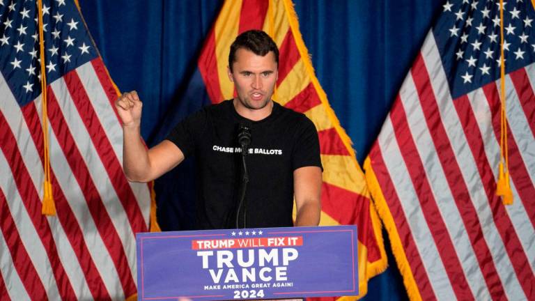FILE PHOTO: Co-founder of Turning Point USA Charlie Kirk speaks during the rally of Republican U.S. vice presidential nominee Senator JD Vance in Scottsdale, Arizona, U.S. November 2, 2024. REUTERS/Go Nakamura/File Photo