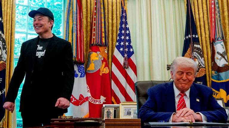 U.S. President Donald Trump and Elon Musk attend a press conference in the Oval Office of the White House in Washington, D.C., U.S., May 30, 2025. - REUTERSPIX
