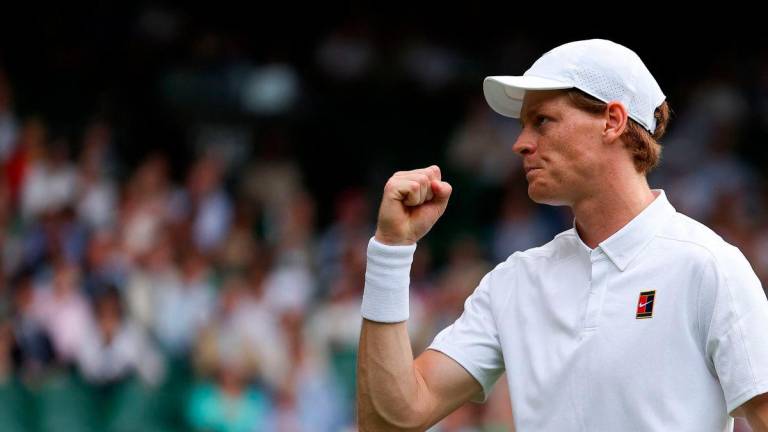 Italy’s Jannik Sinner reacts as he plays against Australia’s Aleksander Vukic during their men’s singles second round tennis match on the fourth day of the 2025 Wimbledon Championships at The All England Lawn Tennis and Croquet Club in Wimbledon, southwest London, on July 3, 2025-AFP