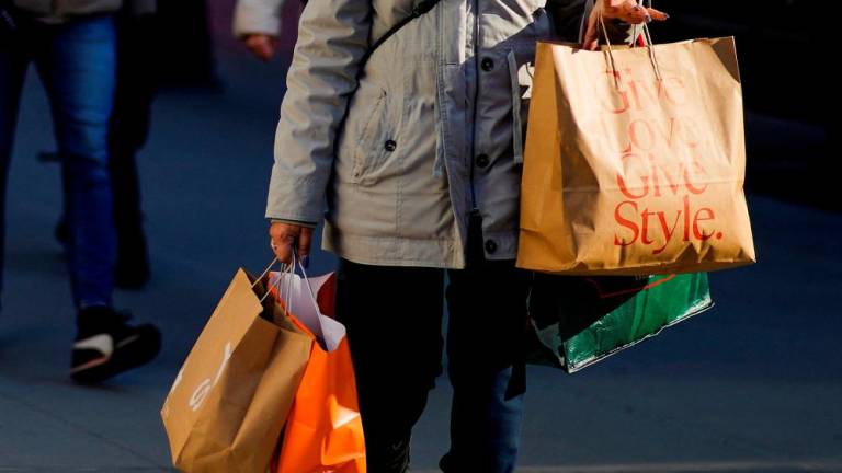 The crucial holiday shopping season has shifted into high gear, with survey data from the US National Retail Federation suggesting consumers plan to spend about 5% more this year. – Reuterspic