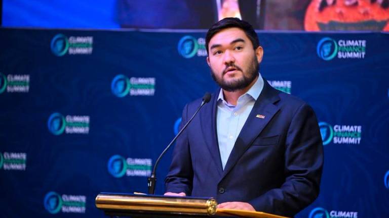 Tengku Amir speaking at the Climate Finance Summit 2025. He says climate finance is not an expense – it is an investment in survival.