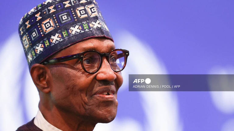 Nigeria’s President Muhammadu Buhari attends the second day of the COP26 UN Climate Summit in Glasgow on November 2, 2021. Former Nigerian president Muhammadu Buhari -- who led his country first as a junta strongman and later as an elected democrat -- died July 12, 2025, at the age of 82, an aide said. - AFP