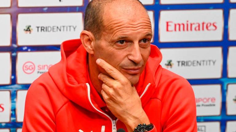 AC Milan’s manager Massimiliano Allegri attends a press conference ahead of their football match against Arsenal at the National Stadium in Singapore on July 21, 2025. - Roslan RAHMAN / AFP