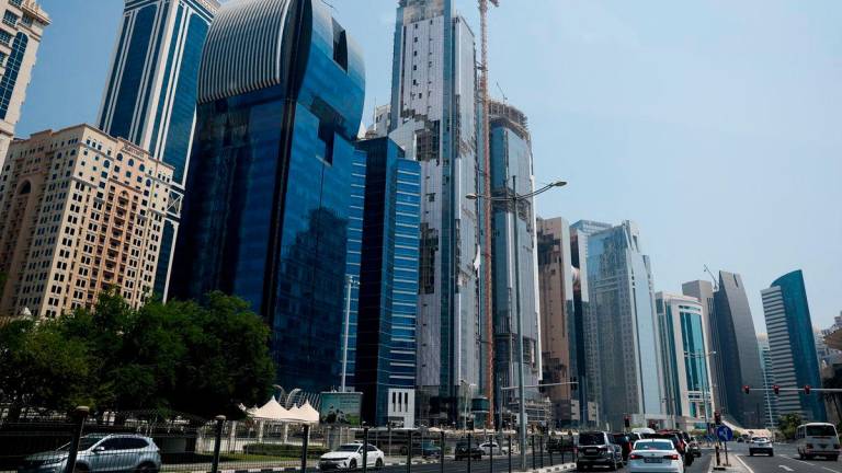 Vehicles stop at a red traffic light, a day after an Israeli attack on Hamas leaders, in Doha, Qatar, September 10, 2025. REUTERS/Ibraheem Abu Mustafa
