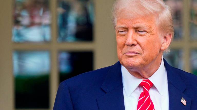 U.S. President Donald Trump looks on as he gives remarks outside the West Wing at the White House in Washington, D.C., U.S., May 8, 2025. REUTERSpix
