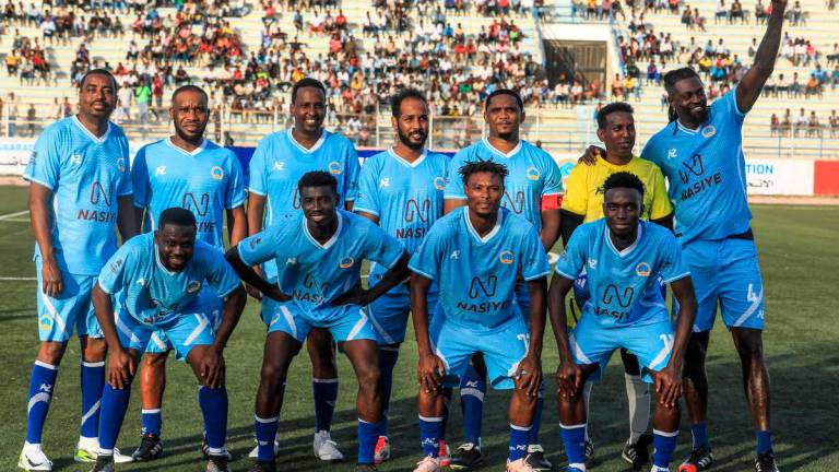 Retired football stars Nigerian Jay-Jay Okocha (2L back), Cameroonian Samuel Eto’o (5thL back) and Togolese Emmanuel Adebayor (R back). AFPpix
