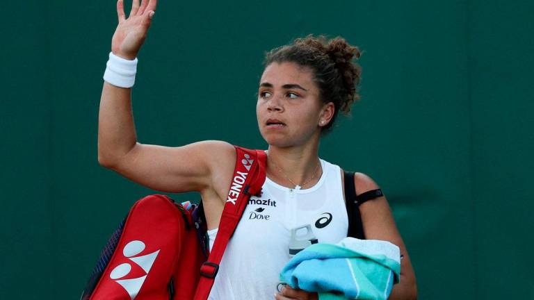 Italy’s Jasmine Paolini leaves the court after losing against Russia’s Kamilla Rakhimova at the end of their women’s singles second round tennis match on the third day of the 2025 Wimbledon Championships at The All England Lawn Tennis and Croquet Club in Wimbledon, southwest London, on July 2, 2025-AFP