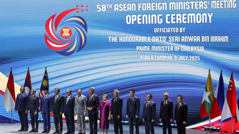 Prime Minister Datuk Seri Anwar Ibrahim poses for a group photo during the 58th ASEAN Foreign Ministers’ Meeting (AMM) and related meetings at the Kuala Lumpur Convention Centre yesterday. - BERNAMA