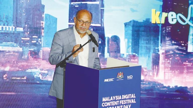 Gobind delivering his keynote speech at Malaysia Digital Content Festival Biz Day 2024.