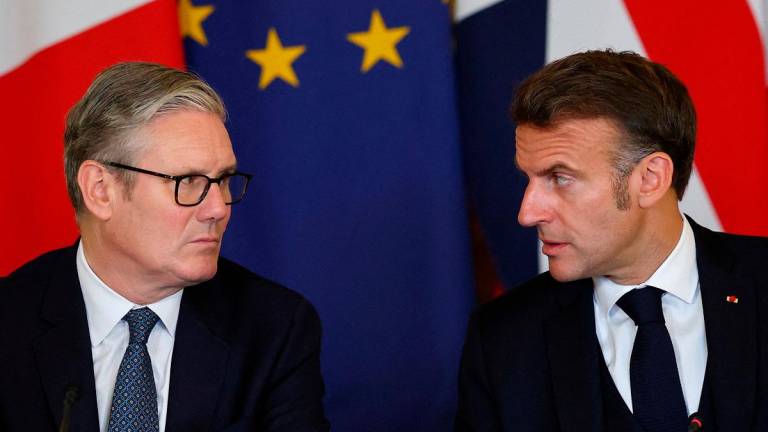 Britain’s Prime Minister Keir Starmer and France’s President Emmanuel Macron attend the UK-France Summit at 10 Downing Street in London, as part of his three-day state visit to the United Kingdom, Britain, July 10, 2025. - REUTERS/Gonzalo Fuentes/Pool