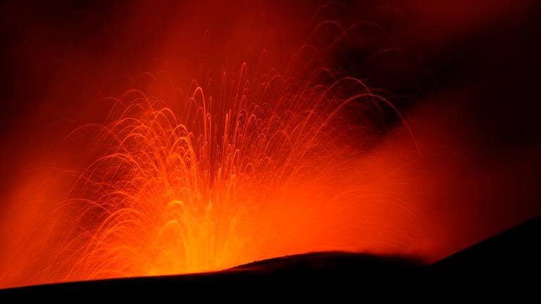 Lava rises from a crater of Mount Etna, Europe’s most active volcano in Italy - REUTERSpix