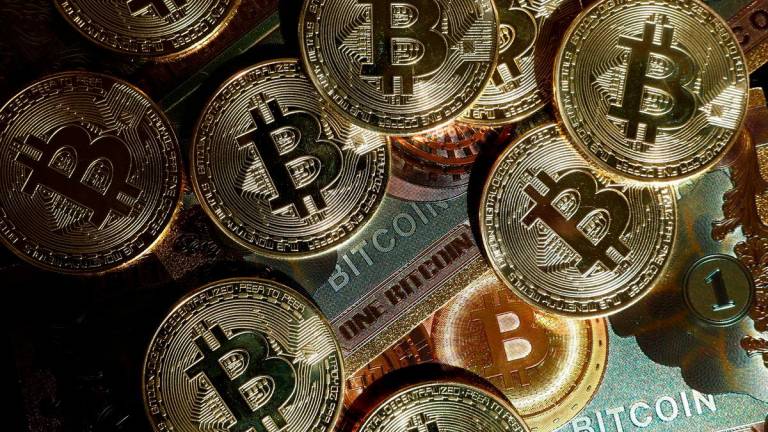 Representations of cryptocurrency Bitcoin are seen in this illustration picture taken in Paris, France, March 9, 2024. REUTERSpix