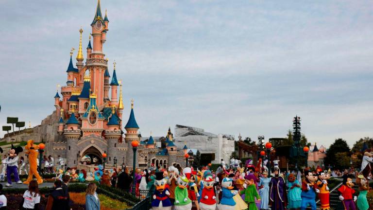 For visual purposes only- Disney cast members take part in a parade during a ceremony marking the 100th anniversary of the Walt Disney Company, held at Disneyland Paris, in Marne-la-Vallee, east of Paris, on October 16, 2023.AFPpix