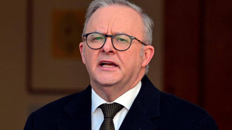 Australian Prime Minister Anthony Albanese speaks at a press conference at Parliament House in Canberra, Australia , August 11, 2025. Prime Minister Albanese says Australia will recognise a Palestinian state at UN general assembly. - AAP/Mick Tsikas via REUTERSPIX