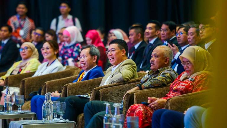 Nga (fourth from left) during the closing ceremony of the Asuf, AGMF and MGMAC 2025 at the Kuala Lumpur Convention Centre yesterday. – ADAM AMIR HAMZAH/THESUN