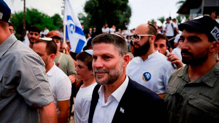 Israeli Finance Minister Bezalel Smotrich walks to visit the Damascus Gate to Jerusalem’s Old City, as Israelis mark Jerusalem Day, in Jerusalem May 26, 2025 - Reuterspix
