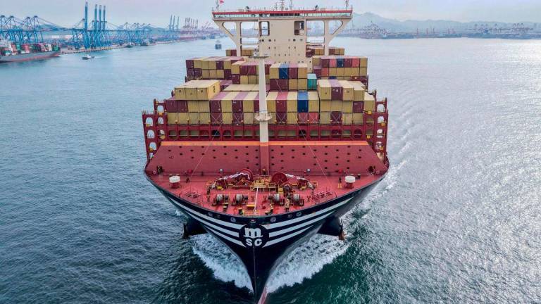 A cargo ship loaded with containers leaves the port in Qingdao, in eastern China’s Shandong province on May 7, 2025.. AFPpix