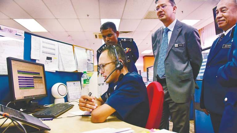 Johan (second, right) getting a first-hand view of operations during his visit to the Royal Malaysian Customs Department in Petaling Jaya. – Bernnamapic