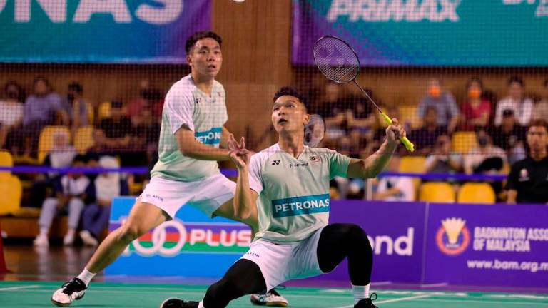 Filepix: Wan Mohd Arif Sharuddin Wan Junaidi (front) and Yap Roy King - BERNAMA