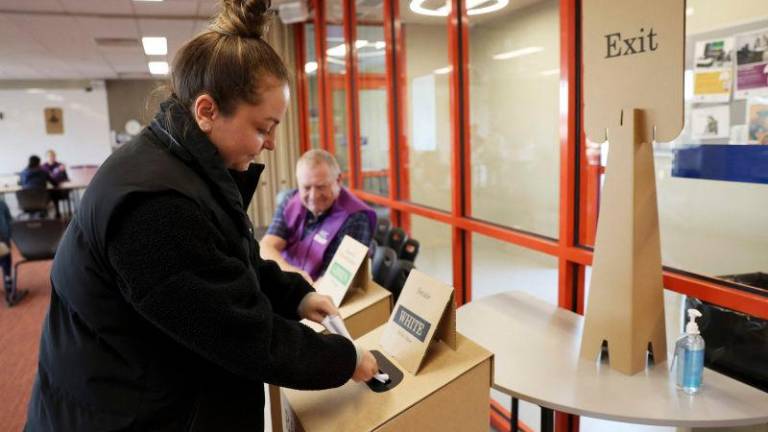 A voter casts her ballot in Australia’s general election at a polling station in Melbourne on May 3, 2025.AFPpix