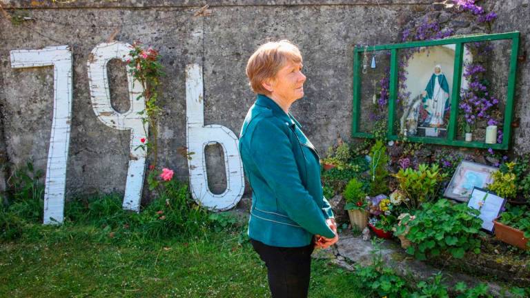Historian Catherine Corless poses on the site of the former St Mary’s Mother and Baby Home, in Tuam, in the outskirts of Galway, western Ireland, a site believed to be containing a mass grave of children and mothers, on May 20, 2025.