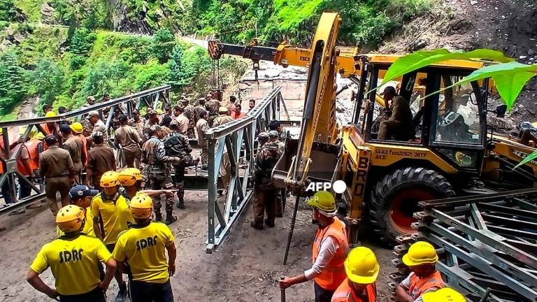Army and rescue personnel construct a bailey bridge near the Bhatwari village in the Uttarkashi district on August 8, 2025, following a cloudburst that caused a massive mudslide and flash floods in India's Uttarakhand state. - AFPpix