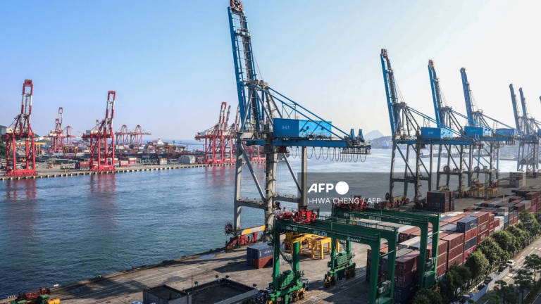 Gantry cranes are seen at the Port of Keelung in Keelung on August 7, 2025. - AFP
