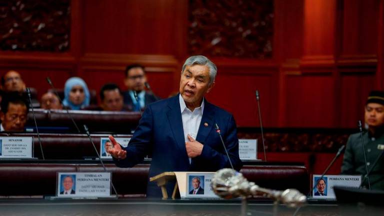 Timbalan Perdana Menteri yang juga Menteri Kemajuan Desa dan Wilayah Datuk Seri Dr Ahmad Zahid Hamidi ketika menjawab atas perbahasan titah diraja 2025 pada Mesyuarat Pertama Penggal Keempat Parlimen ke-15 di Dewan Negara. - fotoBERNAMA