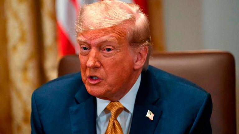 US President Donald Trump speaks during a cabinet meeting in the Cabinet Room of the White House in Washington, DC, on July 8, 2025. (Photo by ANDREW CABALLERO-REYNOLDS / AFP)