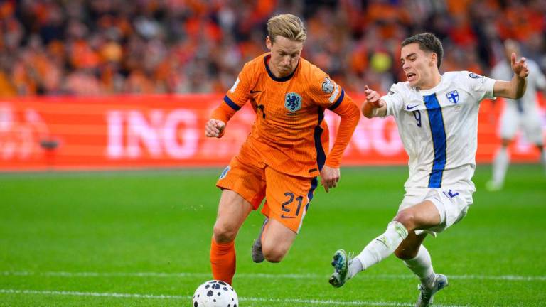 Netherlands’ midfielder #21 Frenkie De Jong (L) fights for the ball with Finland’s midfielder #9 Leo Walta during the FIFA World Cup 2026 Group G qualification football match between Netherlands and Finland, at the Johan Cruyff Arena in Amsterdam, on October 12, 2025. AFPPix