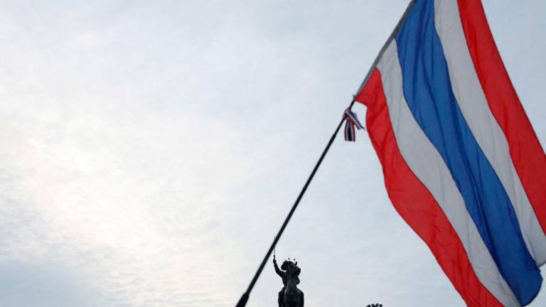 A Thailand’s flag is seen as royalists hold an event to support the monarchy in Bangkok, Thailand, October 28,2020. REUTERSpix